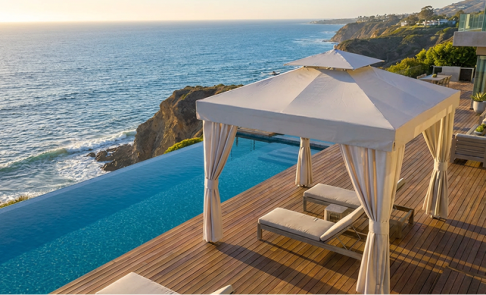 Frankford white Marbella cabana on oceanfront deck with luxury outdoor shade structure overlooking t