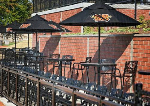 Boomers Baseball Beer Garden featuring custom black market umbrellas with custom branding.